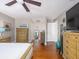 This main bedroom features wood floors and large windows at 2338 Tuscarora Trl, Maitland, FL 32751