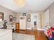 Comfortable home office featuring hardwood floors, storage cabinets, and decor at 2338 Tuscarora Trl, Maitland, FL 32751