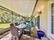 Screened-in patio with a seating and dining area at 2338 Tuscarora Trl, Maitland, FL 32751