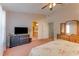Spacious bedroom includes view of the ensuite bathroom and an abundance of closet space at 235 Randle Ave, Oak Hill, FL 32759