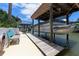 Boat lift and dock with convenient waterway access at 235 Randle Ave, Oak Hill, FL 32759