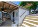 Waterfront property with a covered patio and dock access at 235 Randle Ave, Oak Hill, FL 32759