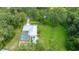 A sprawling backyard features pool and a surrounding fence at 2360 Mooneyham Dr, New Smyrna Beach, FL 32168