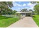 Charming single story home featuring a white picket fence and well maintained lawn at 2360 Mooneyham Dr, New Smyrna Beach, FL 32168