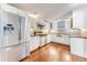 Modern kitchen featuring stainless steel appliances, granite countertops, and custom cabinetry, a culinary enthusiast's dream at 2360 Mooneyham Dr, New Smyrna Beach, FL 32168
