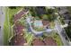 Aerial view of the community pool, well-maintained landscaping, and residential buildings at 258 W Sabal Palm Pl # 22, Longwood, FL 32779