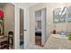 Bathroom showcasing the vanity, toilet room, and bedroom access at 258 W Sabal Palm Pl # 22, Longwood, FL 32779