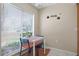 Cozy dining area bathed in natural light from the window, perfect for casual meals at 258 W Sabal Palm Pl # 22, Longwood, FL 32779