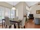 Dining area with vaulted ceilings, hardwood floors, and fireplace at 258 W Sabal Palm Pl # 22, Longwood, FL 32779