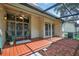 Outdoor patio with a ceiling fan, stylish decor, and comfortable seating area perfect for relaxation at 258 W Sabal Palm Pl # 22, Longwood, FL 32779