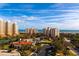 Beautiful aerial view overlooking resort style buildings and beach with ocean views at 265 Minorca Beach Way # 902, New Smyrna Beach, FL 32169