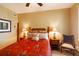 Well decorated bedroom offering a decorative bed set and dual bedside lamps at 265 Minorca Beach Way # 902, New Smyrna Beach, FL 32169