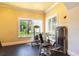 Fully-equipped fitness center with modern exercise machines and natural light at 265 Minorca Beach Way # 902, New Smyrna Beach, FL 32169