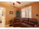 Cozy seating area featuring a reclining leather sofa and an ornate end table at 265 Minorca Beach Way # 902, New Smyrna Beach, FL 32169