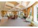 This bright lounge area features comfortable seating, large windows, and pleasant views at 265 Minorca Beach Way # 902, New Smyrna Beach, FL 32169