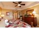 Comfortable bedroom with natural light, and a tastefully appointed dresser at 265 Minorca Beach Way # 902, New Smyrna Beach, FL 32169