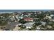 Charming neighborhood featuring a variety of homes, lush greenery, and mature trees at 265 Minorca Beach Way # 902, New Smyrna Beach, FL 32169