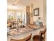 Bright kitchen with an island, stone countertops, stainless sink and pendant lighting at 2672 Star Coral Ln, New Smyrna Beach, FL 32168