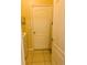 Compact laundry room with tile floors, washer and dryer, and a storage area at 2672 Star Coral Ln, New Smyrna Beach, FL 32168