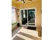 Relax on this home's shaded patio, complete with sliding glass doors and overhead lighting at 2672 Star Coral Ln, New Smyrna Beach, FL 32168