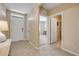 Inviting entryway with tile floors, neutral colors, and bright natural light at 2731 Neverland Dr, New Smyrna Beach, FL 32168