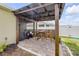 Charming backyard patio area with string lights at 2731 Neverland Dr, New Smyrna Beach, FL 32168