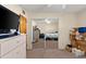 Bedroom features a large mirrored closet, neutral walls, and ceiling fan at 2901 N Halifax Ave # 215, Daytona Beach, FL 32118