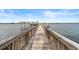 Waterfront pier with a covered seating area and fishing pier at 2901 N Halifax Ave # 215, Daytona Beach, FL 32118