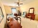 Bedroom featuring neutral paint, ceiling fan, and comfortable furniture at 2918 Mango Tree Dr, Edgewater, FL 32141
