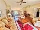 Spacious living room with vaulted ceilings, stylish decor, and an open layout perfect for entertaining at 2918 Mango Tree Dr, Edgewater, FL 32141