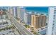 Expansive aerial shot highlights beachfront condos, lush landscaping, and scenic ocean views at 3023 S Atlantic Ave # 8010, Daytona Beach, FL 32118