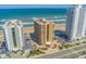 Beautiful aerial view of beachfront condos, pool, and well-manicured landscaping at 3023 S Atlantic Ave # 8010, Daytona Beach, FL 32118