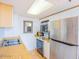 Cozy kitchen featuring stainless steel appliances and a wood countertop at 3023 S Atlantic Ave # 8010, Daytona Beach, FL 32118
