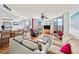 Well-lit living room and dining area with tile flooring and expansive city views at 3023 S Atlantic Ave # 8010, Daytona Beach, FL 32118