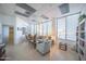 Large living room area featuring plenty of seating, a small table, and large windows at 3023 S Atlantic Ave # 8010, Daytona Beach, FL 32118