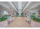 Lobby with plants, seating, and beautiful decoration at 3023 S Atlantic Ave # 8010, Daytona Beach, FL 32118