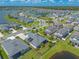 Neighborhood aerial view highlighting well-maintained homes, landscaping, and convenient community features at 3027 Portofino Blvd, New Smyrna Beach, FL 32168