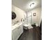 Bathroom features a glass door shower and stylish fixtures at 306 Murray St, New Smyrna Beach, FL 32168