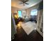 Cozy bedroom with wood floors, nice rug and natural light at 306 Murray St, New Smyrna Beach, FL 32168