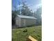 Detached garage with a metal roof at 306 Murray St, New Smyrna Beach, FL 32168