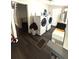 A laundry room featuring a modern washer and dryer at 306 Murray St, New Smyrna Beach, FL 32168