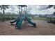 Community playground with slides and climbing structures offers a fun and safe space for children to play at 3103 Nova Scotia Way, New Smyrna Beach, FL 32168