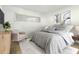 Relaxing bedroom featuring cozy furniture, stylish artwork, and a light and airy feel at 335 N Causeway # E3, New Smyrna Beach, FL 32169