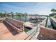 Well-maintained dock with benches, providing easy access to waterfront adventures and community amenities at 335 N Causeway # E3, New Smyrna Beach, FL 32169
