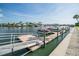 Private boat dock with convenient boat slips and easy access to the waterway, perfect for boaters at 335 N Causeway # E3, New Smyrna Beach, FL 32169