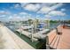 Well-maintained boat slips with docks and benches, offering easy access to waterfront adventures and community at 335 N Causeway # E3, New Smyrna Beach, FL 32169