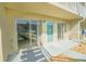Condo exterior with sliding glass doors and patio perfect for enjoying the outdoors at 335 N Causeway # E3, New Smyrna Beach, FL 32169