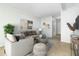 Bright living room with comfortable seating, modern decor, and serene ambiance at 335 N Causeway # E3, New Smyrna Beach, FL 32169