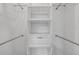 Walk-in closet with white shelving, closet rods, and a built-in drawer at 357 Hearthstone Ter, Port Orange, FL 32127