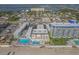 Aerial view of the beach-front condo community with a pool, and close proximity to the ocean at 3615 S Atlantic Ave # 211, Daytona Beach, FL 32118